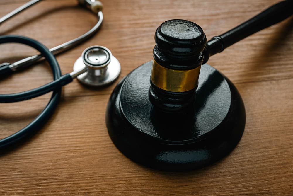 personal injury law. Gavel and stethoscope